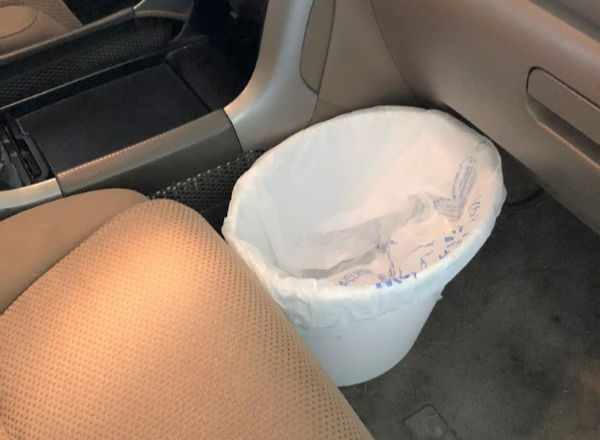 Wife left a bag of donuts on the seat in hot car. How can I clean