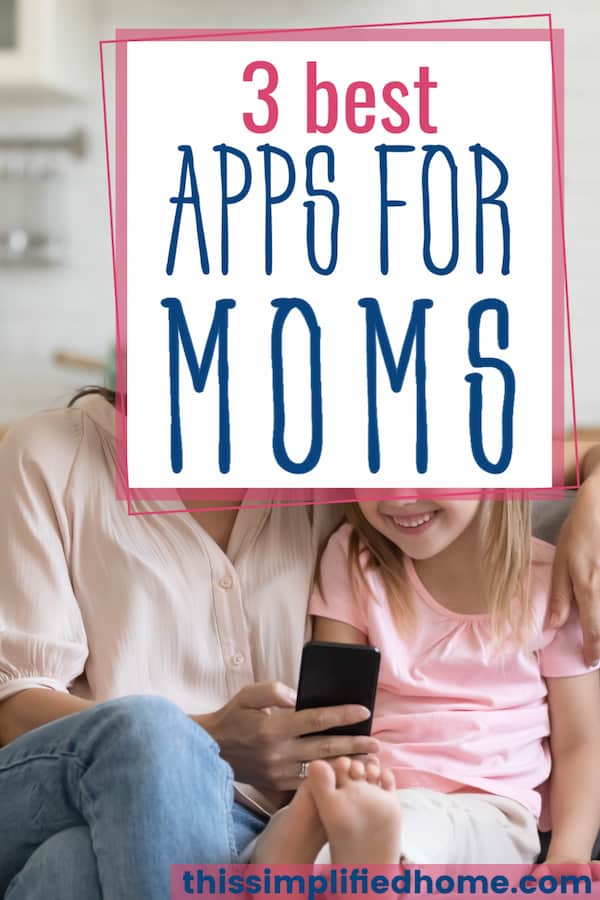 Neck down image of a mom and daughter looking at a cell phone.