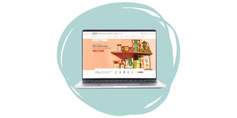 Laptop with the home screen of Thrive Market displayed