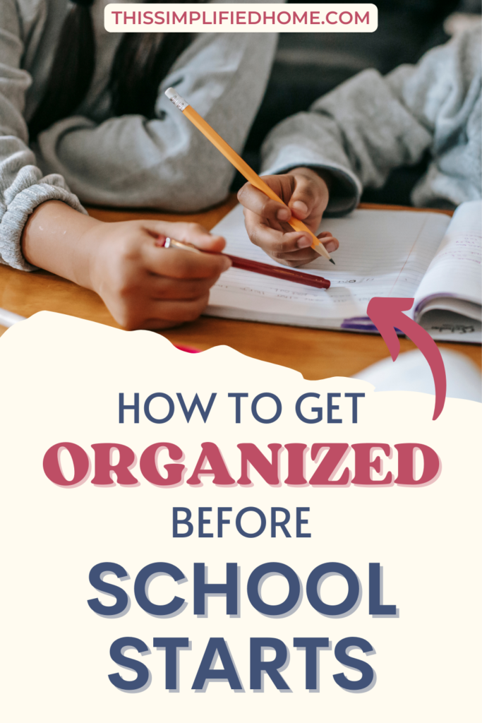 Two small hands holding pencils over a notebook demonstrating they were organized and ready for school to start.